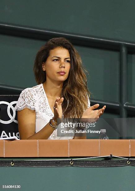 Noura El Shwekh girlfriend of Jo-Wilfried Tsonga of France watches his match against Dominic Thiem of Austria during day ten of the BNP Paribas Open...