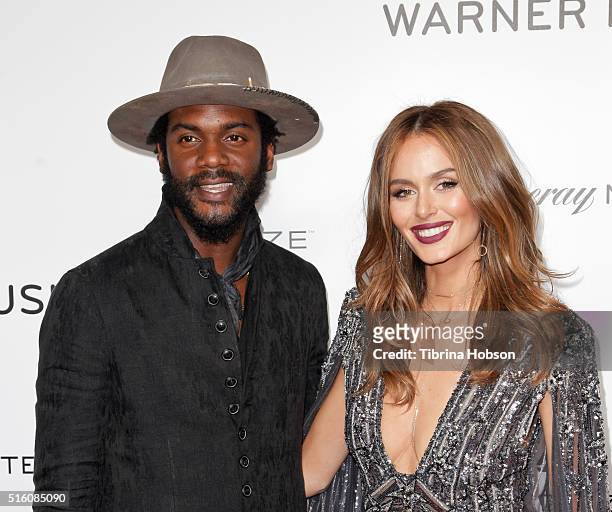Gary Clark Jr. And Nicole Trunfio attend Warner Music Group's annual Grammy celebration at Milk Studios on February 15, 2016 in Los Angeles,...