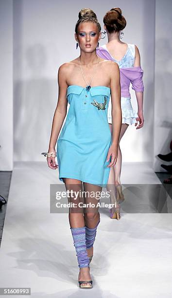 Model walks the runway at the Rojas Spring 2005 show at the Mercedes-Benz Fashion Week at Smashbox Studios in October 28, 2004 Culver City,...