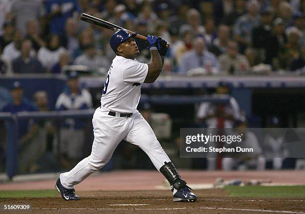 Third baseman Adrian Beltre of the Los Angeles Dodgers takes a swing during the National League Division Series with the St. Louis Cardinals, Game...