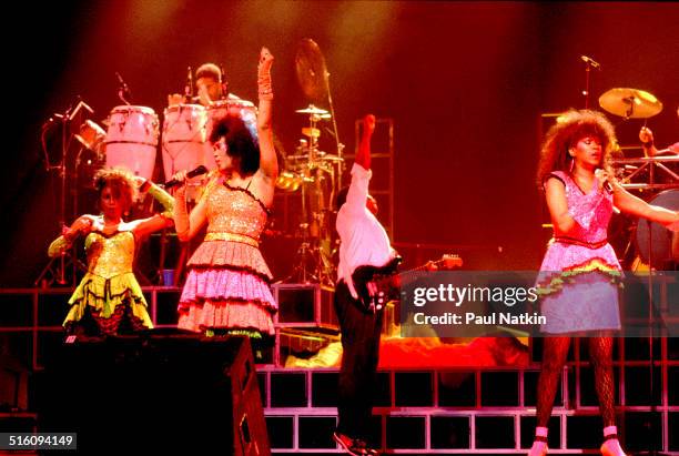 American R&B and pop group the Pointer Sisters perform onstage, Chicago, Illinois, June 27, 1985.