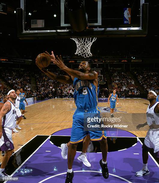 George Lynch of the New Orleans Hornets goes to the basket during a preseason game against the Sacramento Kings at Arco Arena on October 23, 2004 in...