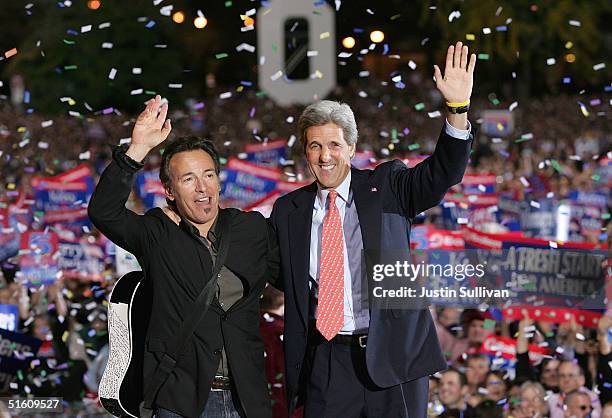 Democratic presidential candidate U.S. Senator John Kerry and musician Bruce Springsteen greet supporters during a rally at Ohio State University...