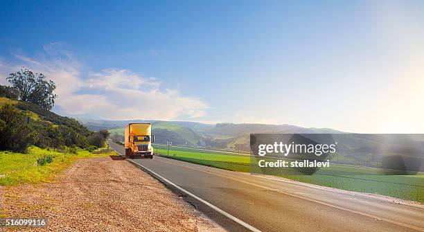 truck on the road - remote location stock pictures, royalty-free photos & images