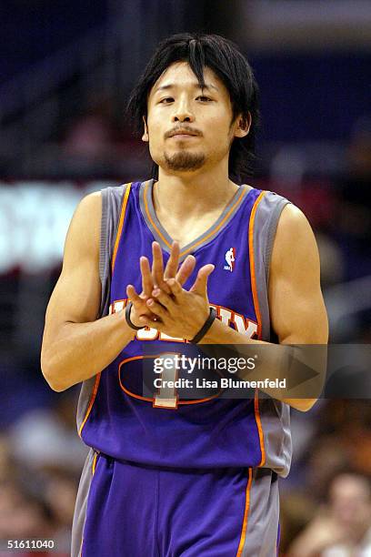Yuta Tabuse of the Phoenix Suns walks upcourt during a preseason game against the Los Angeles Clippers on October 28, 2004 at Staples Center in Los...