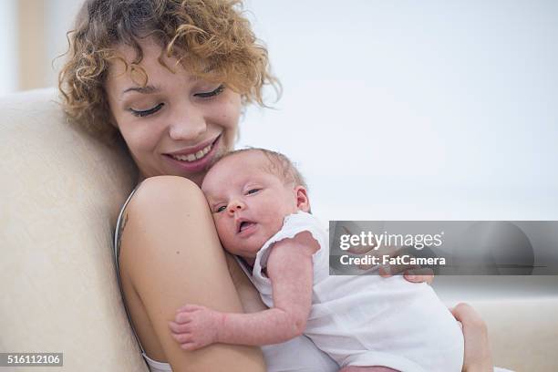 Mother Rocking 152 Mother Rocking Baby To Sleep Stock Photos, High-Res Pictures, and ...