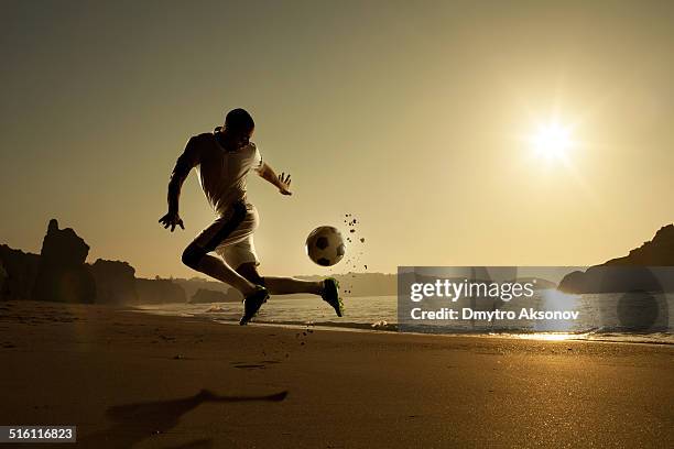 soccer at the beach - international team soccer stock pictures, royalty-free photos & images