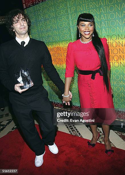 Honoree fashion designer Marc Jacobs and singer Lil' Kim attend The Fashion Group International's 21st Annual Night of Stars at Cipriani's 42nd...