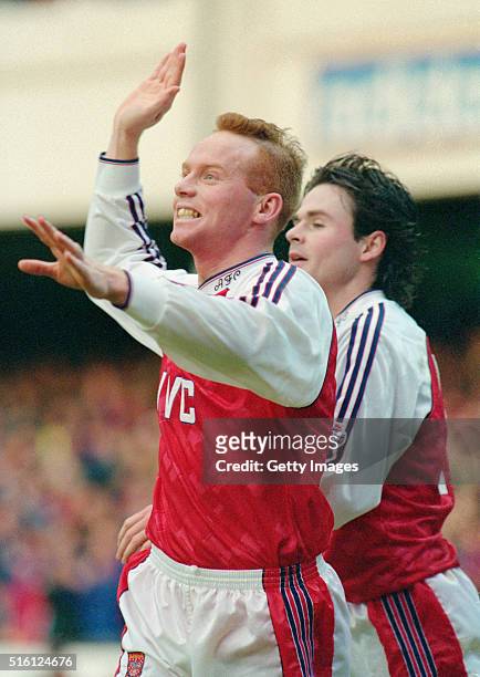 Arsenal player Perry Groves celebrates with Anders Limpar after scoring the first goal in a 2-1 win against Sunderland in an FA Cup match against...