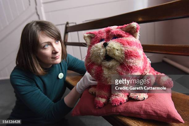 Curator Alice Sage holds up the original Bagpuss during a photocall for the Bagpuss And The Clangers Retrospective Of Smallfilms at the V&A Museum Of...