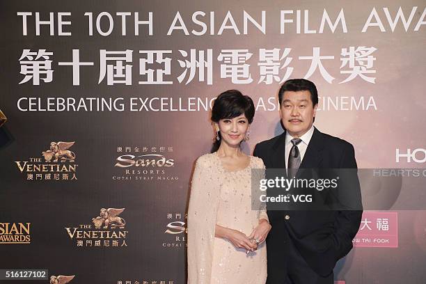 Actress Angie Chiu and her husband Melvin Wong attend the 10th Asian Film Awards at the Venetian Theatre on March 17, 2016 in Macau, China.