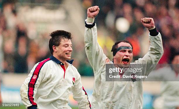 Rob Andrew and Brian Moore celebrate after England had beaten the New Zealand All Blacks 15-9 at Twickenham on November 27, 1993 in London, England.