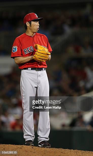 Koji Uehara of the Boston Red Sox pitches during the fifth inning of the Spring Training Game against the Minnesota Twins on March 16, 2016 at...