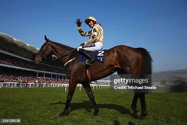 Ruby Walsh celebrates as he rides Black Hercules to victory in the JLT Novices' Chase on day three, St Patrick's Thursday, of the Cheltenham Festival...