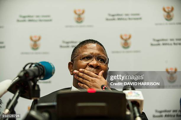 South African Sport Minister Fikile Mbalula gestures as he helds a press conference addressing FIFA allegations that South Africans were involved in...