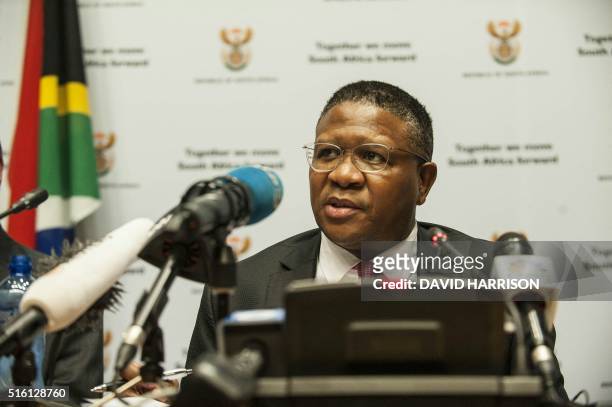 South African Sport Minister Fikile Mbalula gestures as he helds a press conference addressing FIFA allegations that South Africans were involved in...