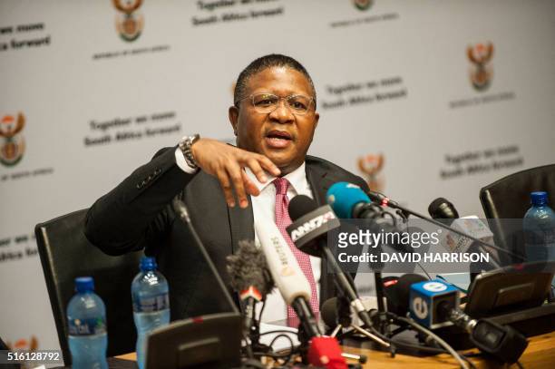 South African Sport Minister Fikile Mbalula gestures as he holds a press conference addressing FIFA allegations that South Africans were involved in...
