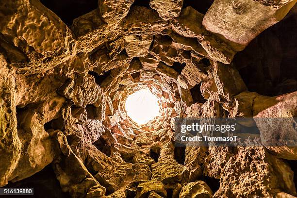 down in a hole - quinta da regaleira photos stock pictures, royalty-free photos & images