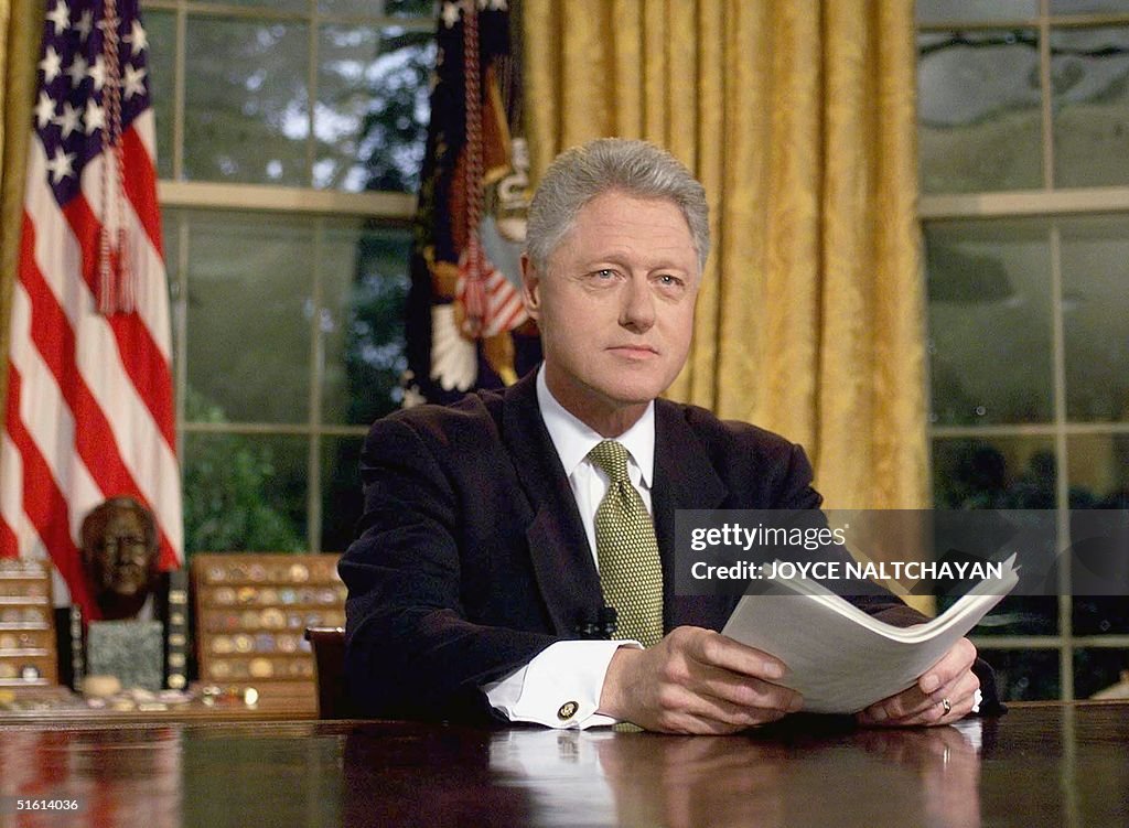 US President Bill Clinton poses for photographs af
