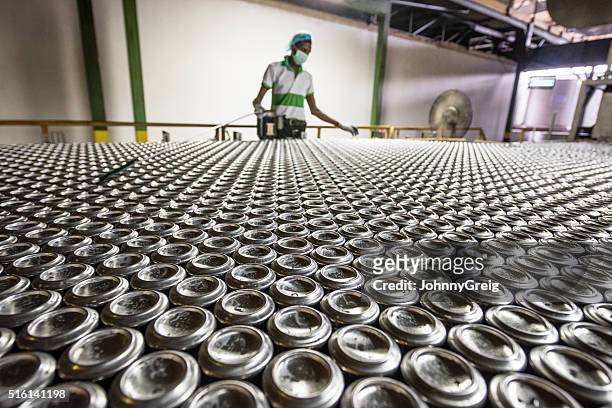 man working in aluminium can processing plant - als stock pictures, royalty-free photos & images