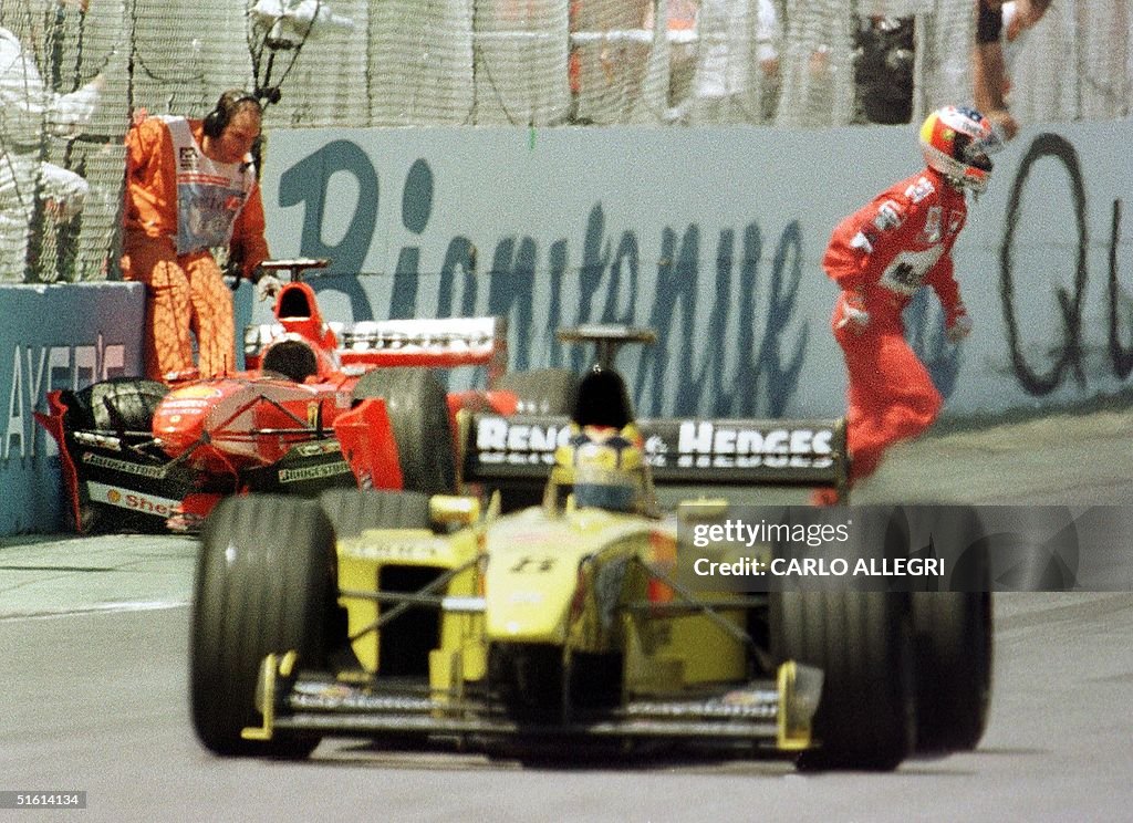 German Formula One driver Michael Schumacher jumps