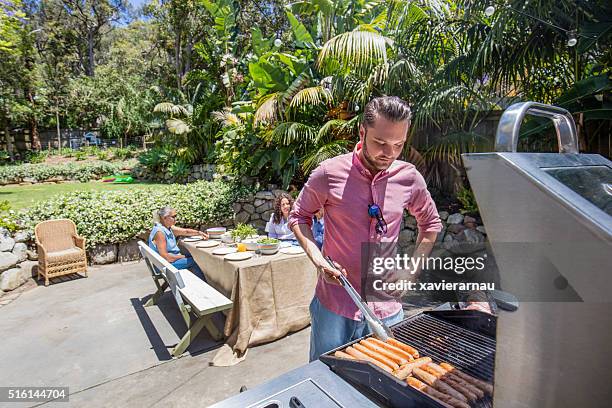 cooking in the  barbecue - australian bbq stock pictures, royalty-free photos & images