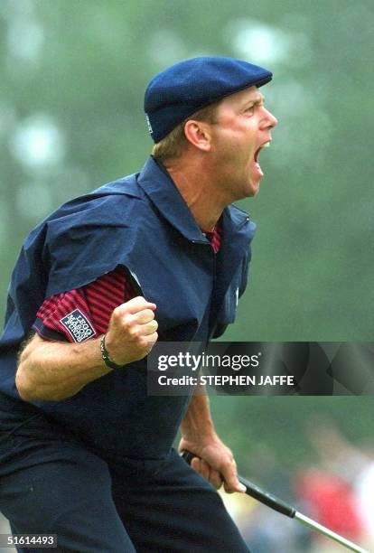 Payne Stewart of the US celebrates after sinking his putt on the eighteenth green at Pinehurst No. 2 during the final round of the US Open...