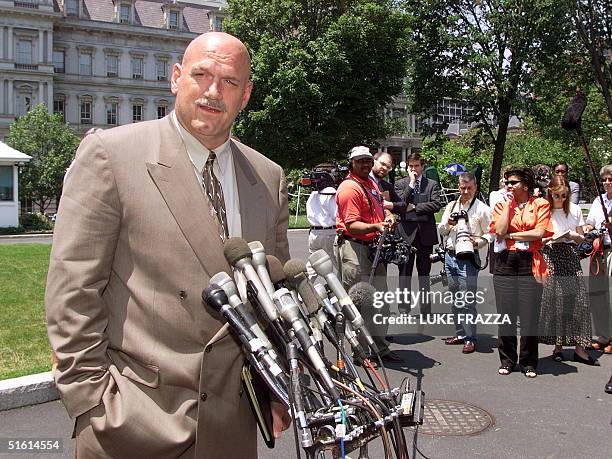 Minnesota Governor Jesse Ventura speaks to reporters 23 June 1999 at the White House in Washington, DC. Ventura said he met with Gene Sperling,...