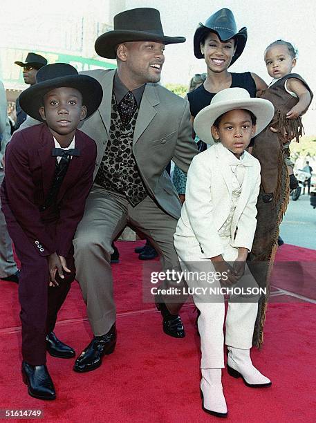 Actor-musician Will Smith arrives at the premiere of the film "Wild Wild West" with his nephew Matthew, wife Jada Pinkett, son Trey, and son Jaden in...