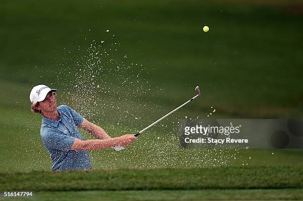 Will Wilcox of the United States hits from a green side bunker on the first hole during the first round of the Arnold Palmer Invitational Presented...