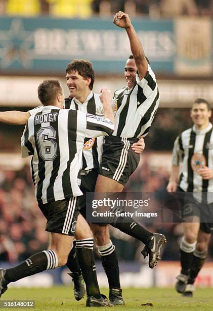 Les Ferdinand is lifted up by Phillipe Albert and Steve Howey as Rob Lee looks on as Ferdinand celebrates the first goal in the 2-0 win over...