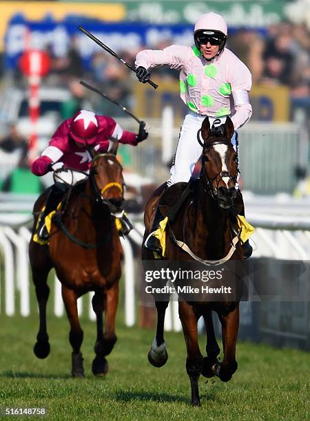 Ruby Walsh rides Vautour to victory in the Ryanair Chase on day three, St Patrick's Thursday, of the Cheltenham Festival at Cheltenham Racecourse on...