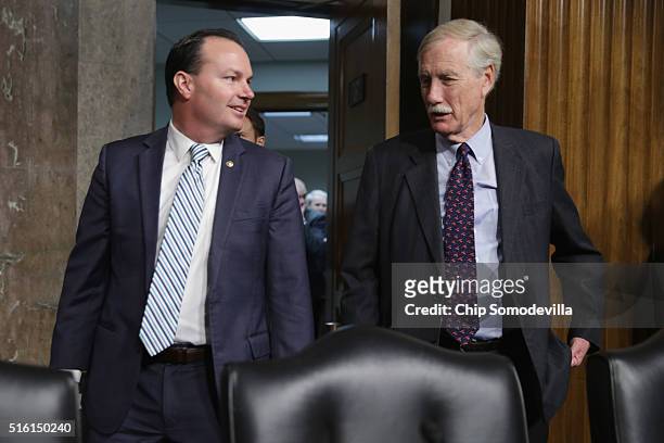 Senate Armed Services Committee members Sen. Mike Lee and Sen. Angus King arrive for hearing about the Pentagon budget in the Dirksen Senate Office...