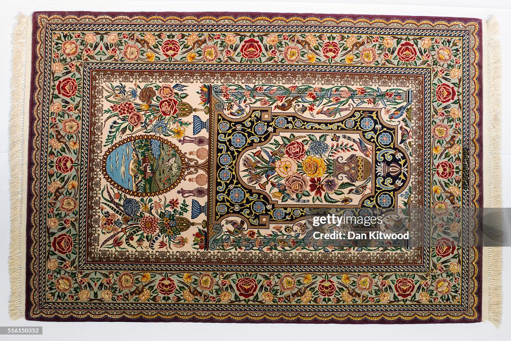 Oriental Rug Specialist Displays Hand Knotted Carpets