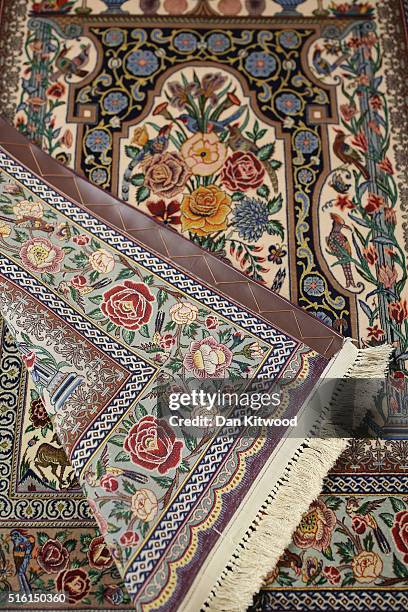 Persian 'Isfahan' Rug is displayed at the Oriental Rug Centre's main warehouse on March 17, 2016 in London, England. The Oriental Rug Centre in North...