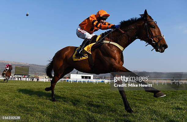 Tom Scudamore rides Thistlecrack to victory in the Ryanair World Hurdle on day three, St Patrick's Thursday, of the Cheltenham Festival at Cheltenham...