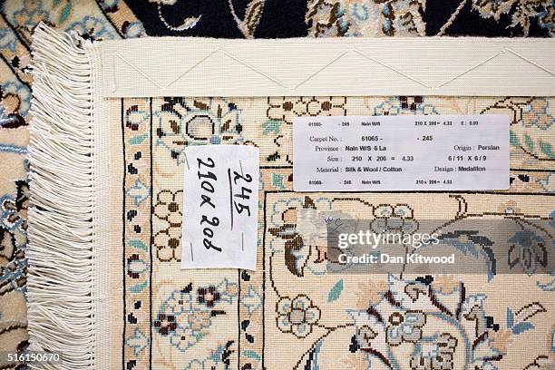 Detail of the back of a 'Nain' Persian rug at the Oriental Rug Centre's main warehouse on March 17, 2016 in London, England. The Oriental Rug Centre...