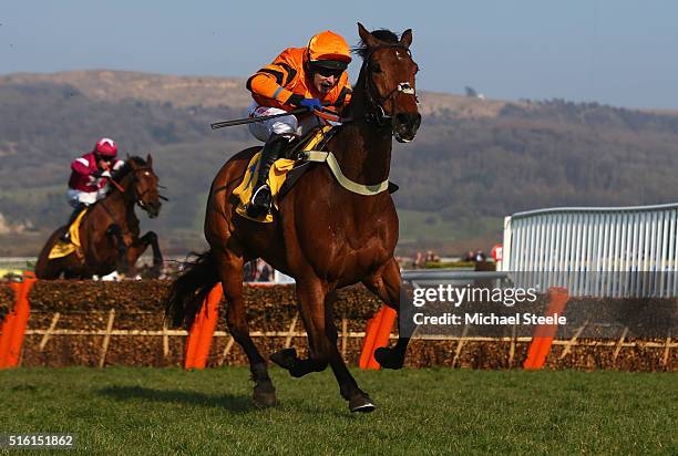 Tom Scudamore rides Thistlecrack to victory in the Ryanair World Hurdle on day three, St Patrick's Thursday, of the Cheltenham Festival at Cheltenham...