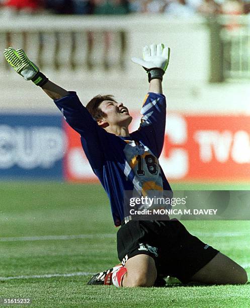 China's goalkeeper Hong Gao celebrates after teammate Wei Pu scores China's first goal against Russia in their 30 June 1999 Women's World Cup match...