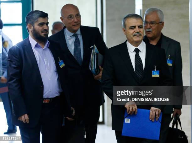 Mohamed Alloush of the Jaish al-Islam, U.N. Deputy Special Envoy for Syria Ramzy Ezzeddine Ramzy, Asaad Al-Zoubi and George Sabra of the delegation...