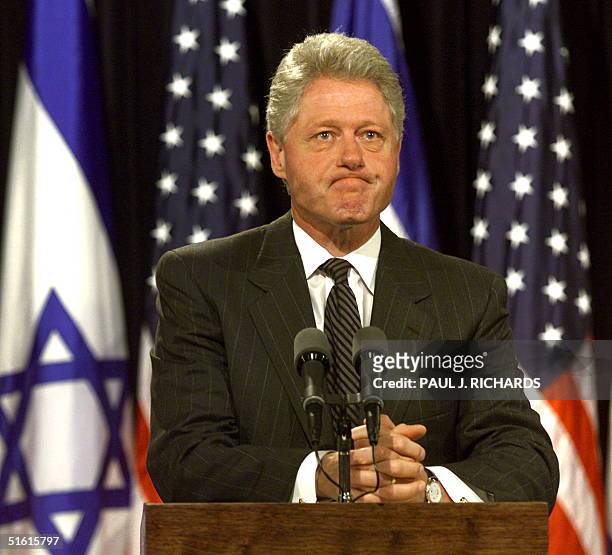 President Bill Clinton responds to a question 19 July about the latest developments in the presumed deaths of John F. Kennedy Jr. And Carolyn...