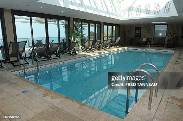 Picture taken on March 17, 2016 in Perros-Guirrec, western France shows the pool of the Hotel L'Agapa. The hotel will host the Albanian team during...