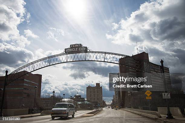 General View of downtown Flint as well as the famed arches bearing the city's nickname "Vehicle City" on March 17, 2016 in Flint, Michigan. Flint...