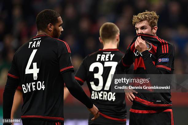 Christoph Kramer of Bayer Leverkusen reacts alongside team mates during the UEFA Europa League round of 16, second leg match between Bayer Leverkusen...