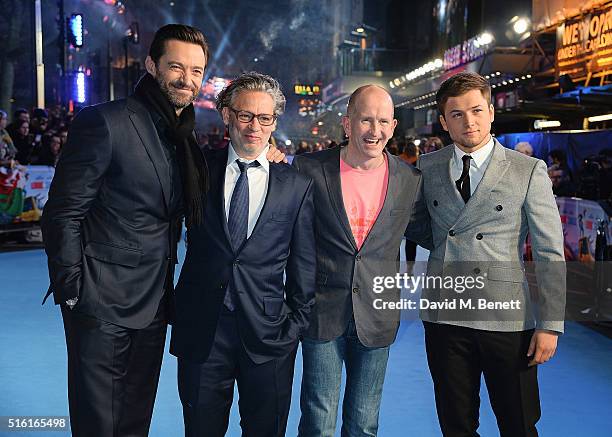 Hugh Jackman, Dexter Fletcher, Eddie Edwards and Taron Egerton attend the European Premiere of "Eddie The Eagle" at Odeon Leicester Square on March...