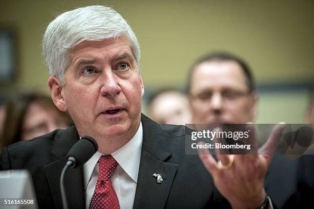 Rick Snyder, governor of Michigan, testifies during a House Oversight and Government Reform Committee hearing in Washington, D.C., U.S., on Thursday,...