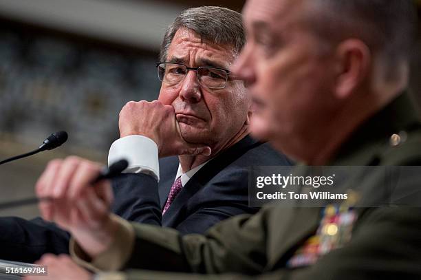 Chairman of the Joint Chiefs of Staff Gen. Joseph F. Dunford, Jr., right, and Defense Secretary Ashton Carter, appear before a Senate Armed Services...
