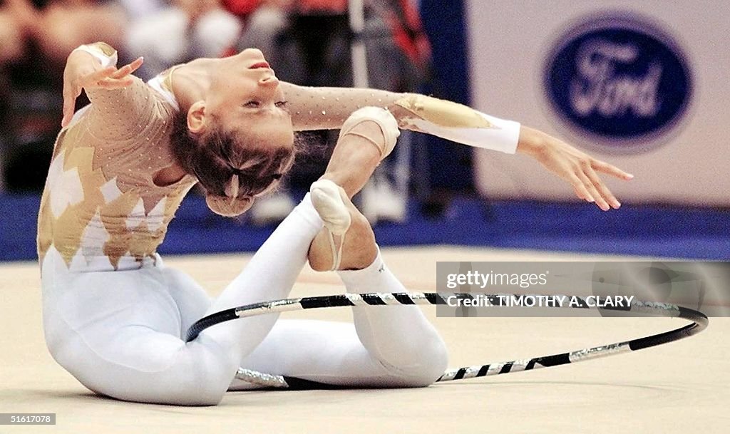 Emilie Livingston of Canada performs with the hoop