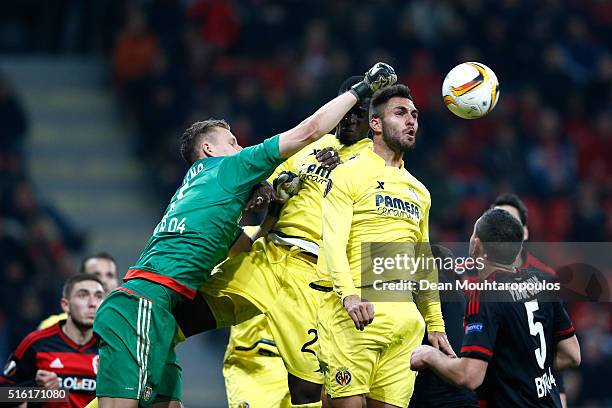 Goalkeeper Bernd Leno of Bayer Leverkusen punches clear during the UEFA Europa League round of 16, second leg match between Bayer Leverkusen and...