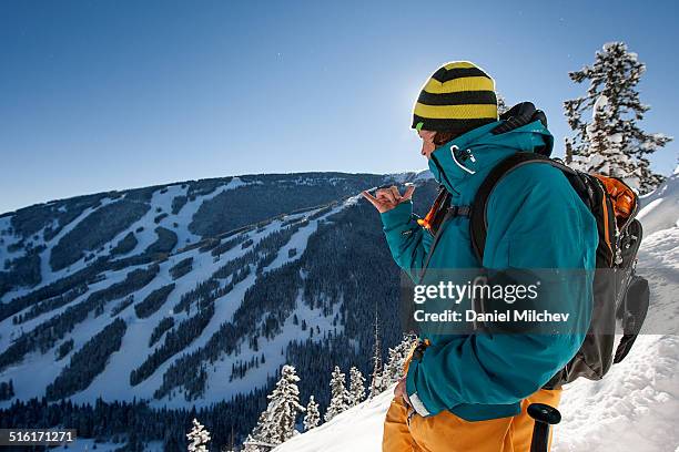 skier looking at beaver creek mountain. - beaver creek colorado stock pictures, royalty-free photos & images
